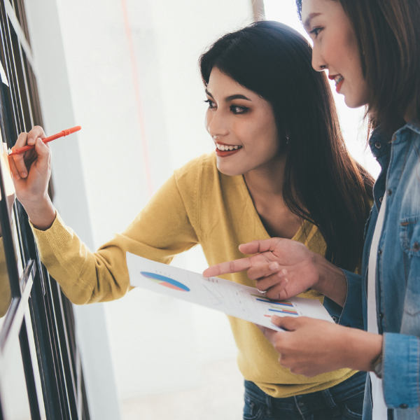 Team members applying collaborative leadership and behaviour-based planning during a strategy session